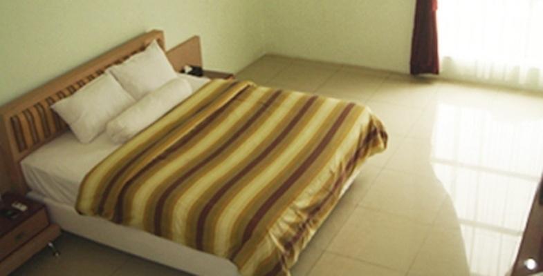 Golden Harvest Hotel Jambi Quarto foto